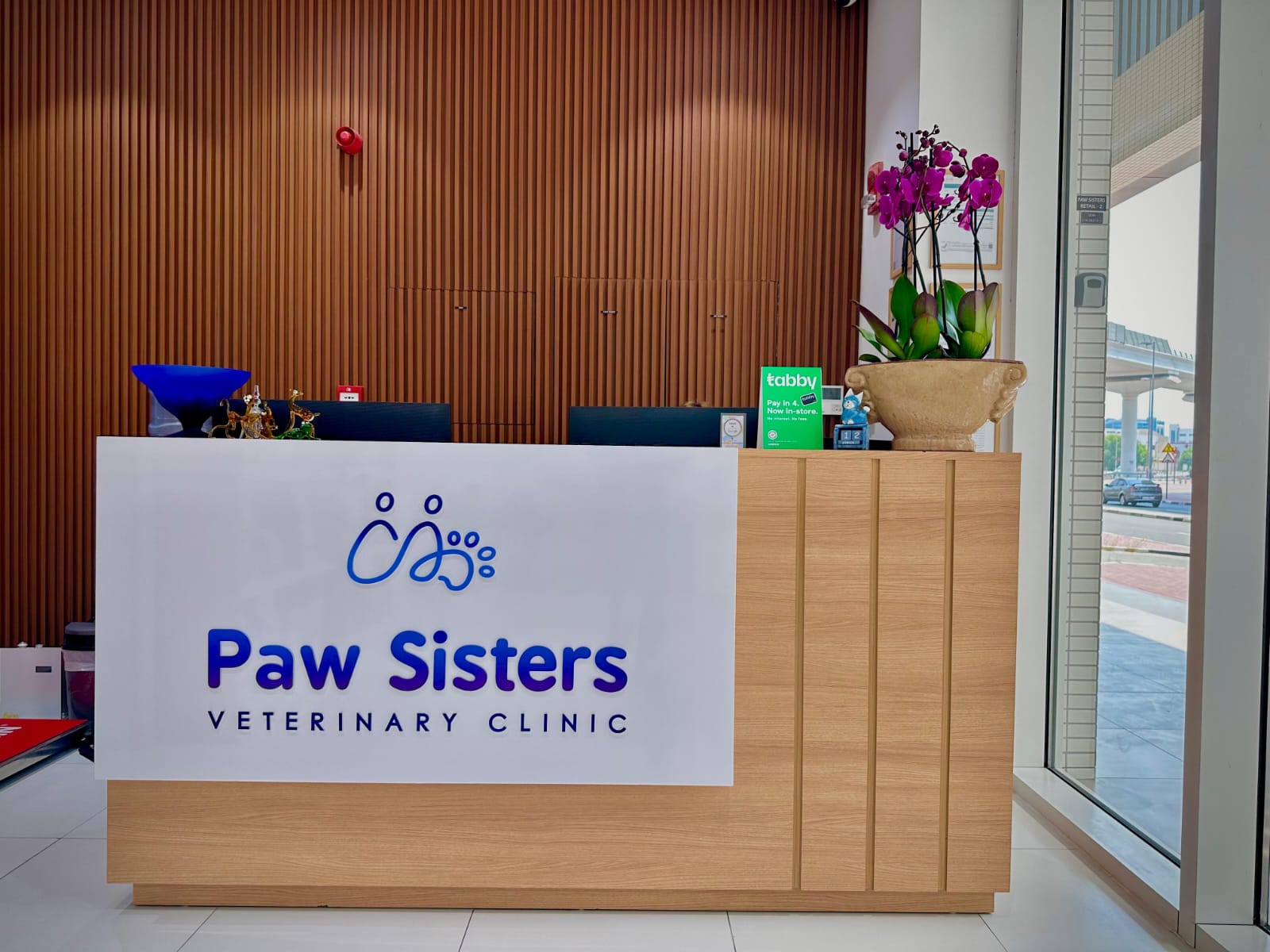 The welcoming reception desk at the Paw Sisters veterinary clinic in Dubai